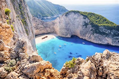 Zacinto Tour En Barco De La Playa Navagio Desde Porto Vromi Getyourguide