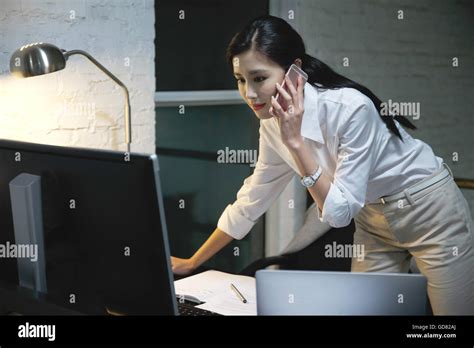 Female White Collar Workers To Work Overtime Stock Photo Alamy