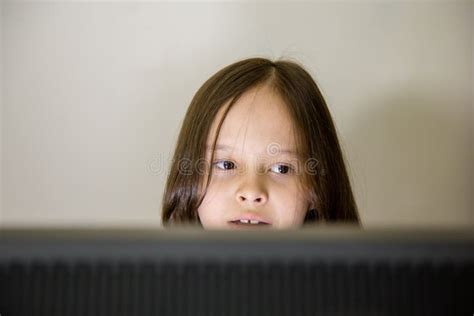 Young Girl Looking At Computer Screen Stock Image Image Of Person