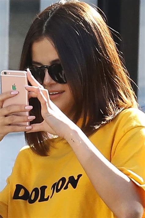 The disney darling recently added to her body art during a visit tattoo artist to the stars, bang bang. Selena Gomez Semicolon Wrist Tattoo | Steal Her Style