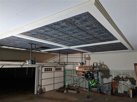 If you've got a low ceiling or dark basement, a great way to add some depth, vibrance, and light is by installing some beveled mirror tiles. Basement Ceiling Tile Ideas & Photos ...