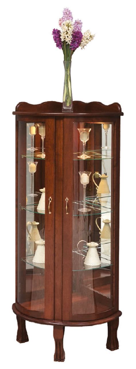 Mirrored curio cabinets create an illusion of a larger space with their reflection. Curved Front Corner Curio - Town & Country Furniture