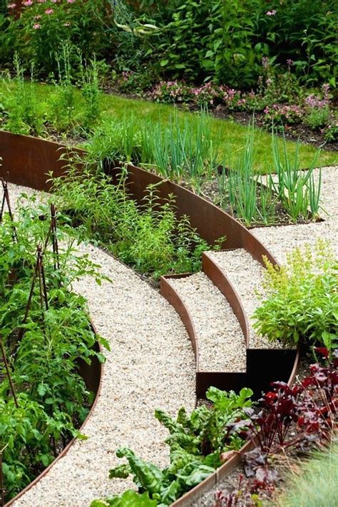 10 Genius Garden Hacks With Rusted Metal Gardenista Sloped Garden