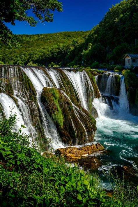 Vertical Of The Beautiful Strbacki Buk Waterfall In Bosnia And