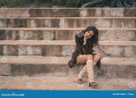 Beautiful Young Woman Sitting On Concrete Steps Stock Photo Image Of
