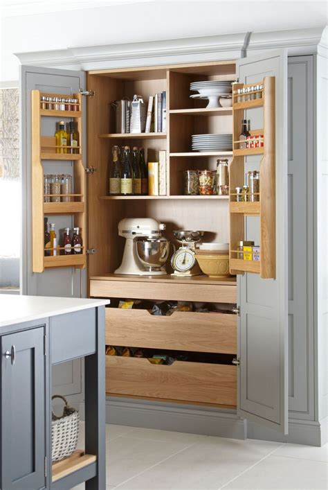 After watching a few too many home makeover shows, you're ready to redo your own space, specifically your kitchen. 19 Wooden Pantry Cabinets For Simple Kitchen - decortheraphy