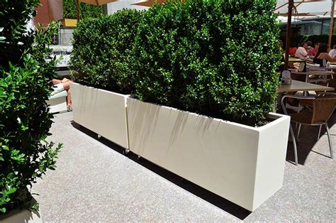 Tips and inspiration to get growing. Movable Planters on Casters DeepStream Designs | Large diy ...