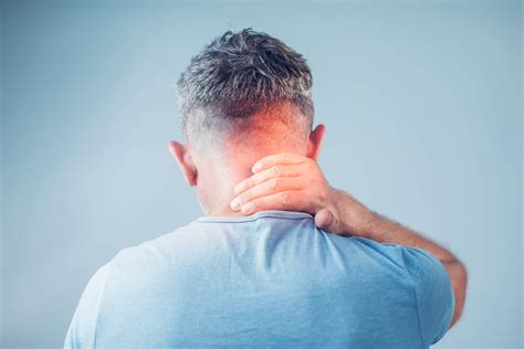 Young Man Suffering From Neck Pain Headache Pain Arizona Pain And