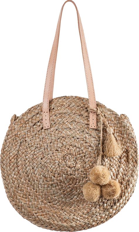 Historiquement, les sacs à main en paille rond pompon ont toujours fonctionné comme des signifiants de pouvoir, de beauté et d'utilisations pratiques. Panier Rond En Paille, Pompons, Bandoulière Cuir - Sac ...