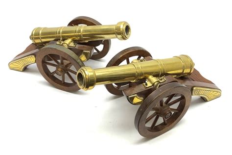 Large Pair Of 20th Century Brass Model Cannons Each On Brass Mounted