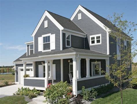 (glaze for wood, paint the house, and plaster over bricks in the colour of your choice). Amazing Gray Exterior Paint Colors Cityscape Sherwin Williams SW 7067 U2014 The Exteri… | House ...