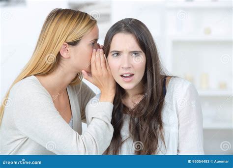 Young Woman Telling Friend Secrets Stock Image Image Of Tattler