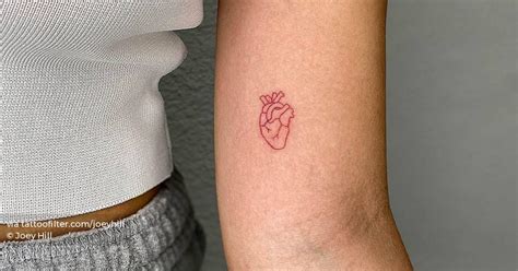 Fine Line Anatomical Heart Tattoo In Red Ink