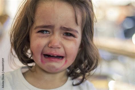 Little Girl Crying Stock Photo Adobe Stock