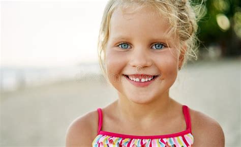 Close Up Portrait Of Happy Cute Little Blonde Girl Stock Photo Image