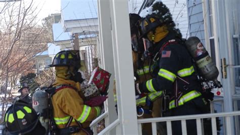 South Portland Firefighters Salvage Presents From House Fire