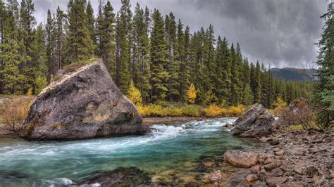 Speeding Blue River Through The Rocks Hd Desktop Wallpaper Widescreen