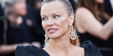 Pamela Anderson Unveils Dramatic New Look On The Cannes Red Carpet