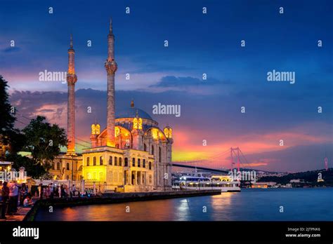 Beautiful Ortakoy Mosque And Istanbul Bosphorus Bridge At Twilight In
