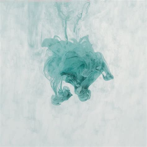 Artistic Splash Of Turquoise Paint In Water Stock Image Image Of