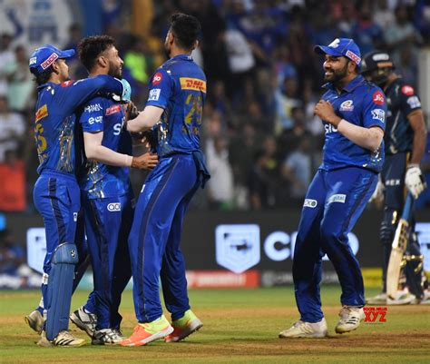 Mumbai Mis Bowler Akash Madhwal With Teammates Celebrate The