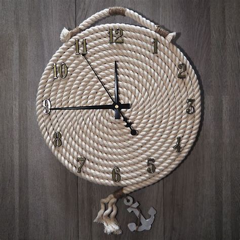 Some of them feature beach scenes while other show flip flops, seashells, starfish, mermaids, and more. Large Beach Wall Clock - Nautical Theme Rope Clock - Gold ...