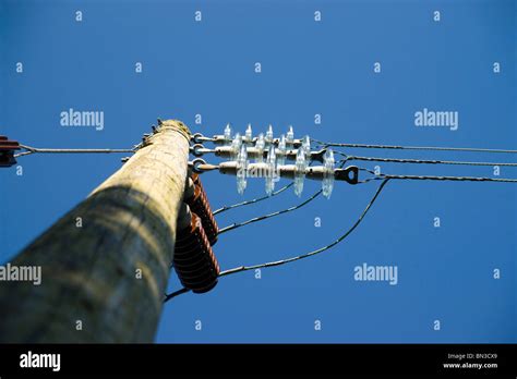 High Voltage Substation On Blue Sky Background With Switch And
