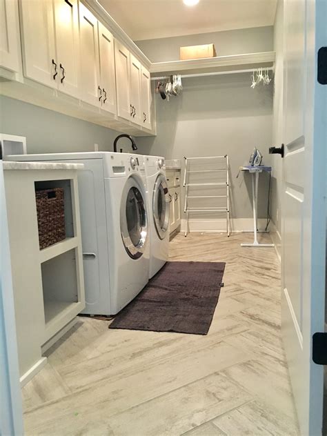 These clever storage solutions and decorating ideas will have you. FLOORS | Laundry room, Laundry mud room, Laundry room design