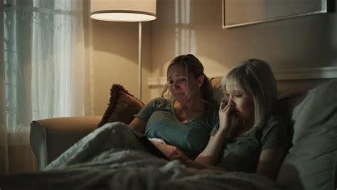 Crying Mother And Daughter On Sofa Streaming Sad Movie On Digital