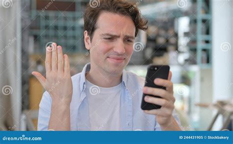 Man Reacting To Loss On Smartphone Stock Image Image Of Working