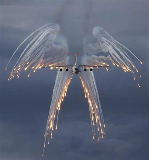 A C 130 Hercules Deploying Flares Sometimes Referred To As Angel