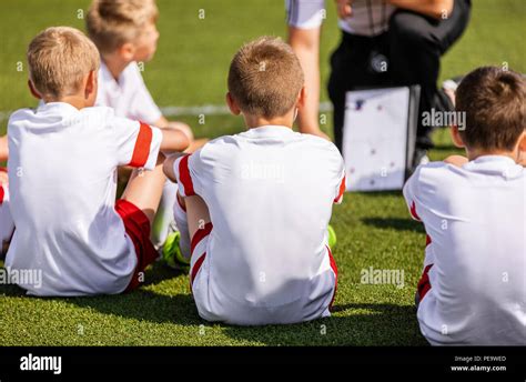 Football Coach Coaching Kids Using Tactic Strategy Whiteboard Soccer