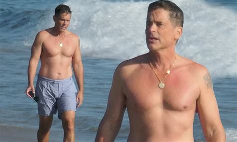 Rob Lowe Bares His Muscles As He Goes Shirtless For A Walk On The Beach In Santa Barbara