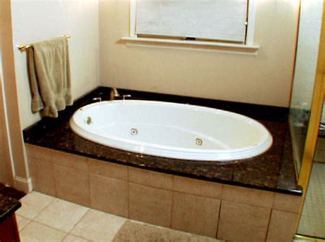 Rectangular models install much like a standard tub, except that a gfci electrical receptacle is required. How to Install a Whirlpool Bathtub | how-tos | DIY