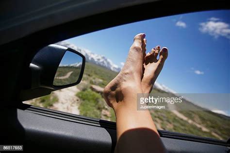 female feet hanging out of car window stock fotos und bilder getty images