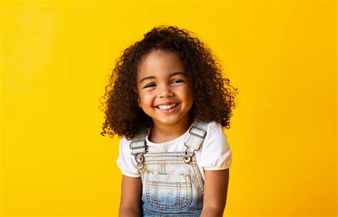 Happy Smiling Africanamerican Child Girl Yellow Background Stock Photo