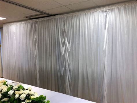 White Fabric Backdrop With Stand Hire Bridal Table Centrepiece Rental