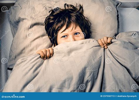 Little Boy Covering His Face Scared Of Nightmares Stock Image Image