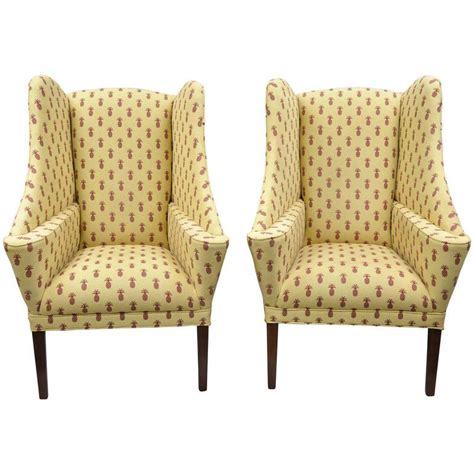 Pair Of Oversized Custom Wingback Chairs With Pineapple Printed Yellow