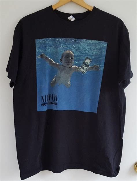 Spencer elden, the man whose unusual baby portrait was used for one of the most recognizable album covers of all time, nirvana 's nevermind, filed a. Nirvana Nevermind Baby Album Cover Black T-Shirt Men's ...