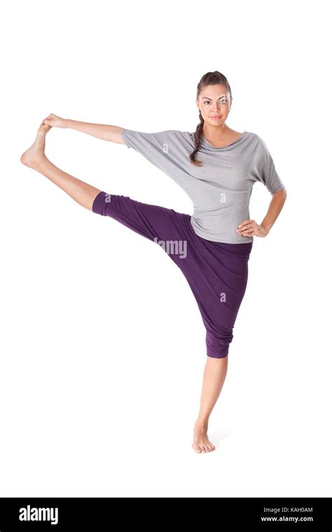 Young Woman Doing Yoga Exercise Utthita Hasta Padangustasana Isolated