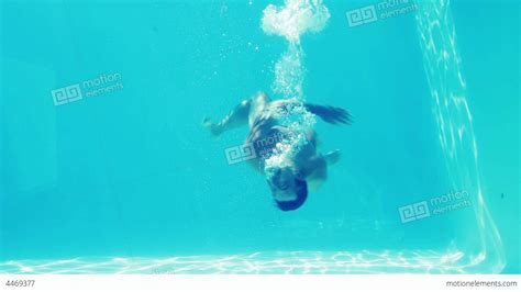Handsome Man Swimming Towards Camera Underwater Stock Video Footage