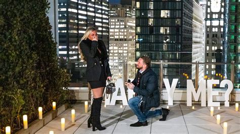 romantic private rooftop proposal in nyc her reaction is priceless youtube