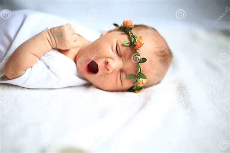 Serene Newborn Baby On A Bed Yawning Stock Image Image Of Crib