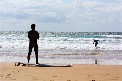 File Surfers On Beach