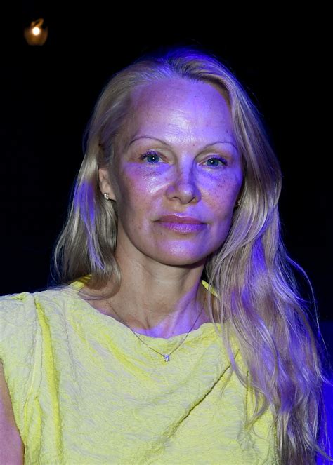 pamela anderson 56 shocks while makeup free at fashion week and everyone is saying the same