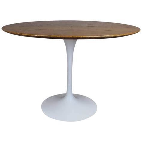In addition to the tables with marble tops in white or arabescato (white with grey) available here. Eero Saarinen Tulip Base Dining Table at 1stdibs