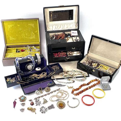 Lot 273 - Four boxes of costume jewellery.