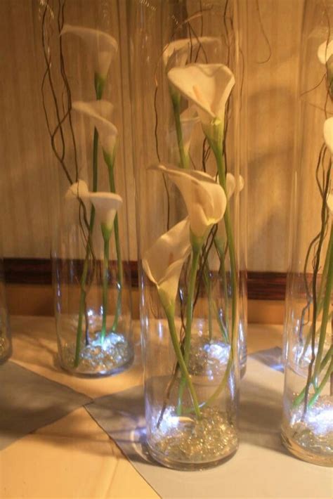 By doing so, you'll have to either dig up and overwinter the rhizomes or. Center P | Wedding table centerpieces purple, Wedding ...