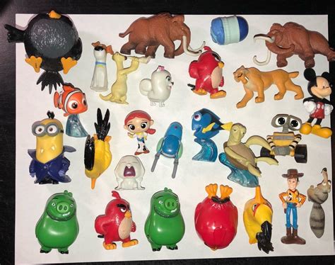26 Mini Figures From Kids Animated Movies Including Some Disney Toy
